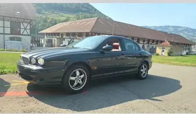 Jaguar X-TYPE 3.0 V6 Sport — Berline anglaise d'exception, 231 ch et intérieur rouge — Detail