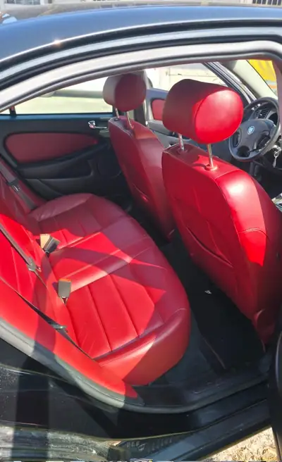 Jaguar X-TYPE 3.0 V6 Sport — Berline anglaise d'exception, 231 ch et intérieur rouge — Innenraum