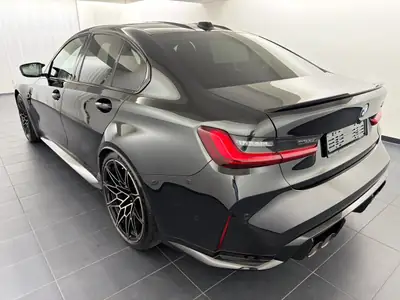 BMW M3 Competition M xDrive 2025 — Berline sportive haute performance, 6 200 km seulement — side view