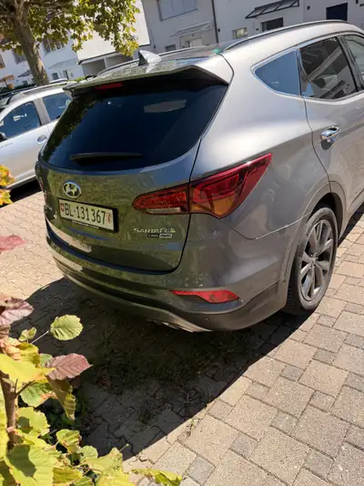 Hyundai Santa Fe 2.2 CRDi Vertex 7 places — SUV robuste, 4x4 permanent, équipement premium — Heckansicht