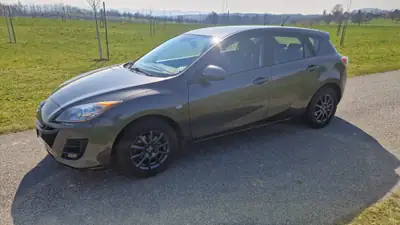 Mazda 3 1.6 Exclusive — Berline fiable, bien équipée et économe — arrière