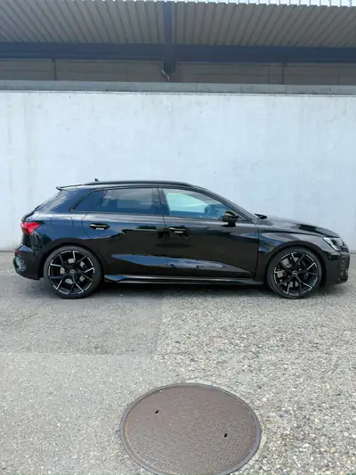 Audi RS3 Sportback 2.5 TSI quattro — 400 ch, design Black Full, occasion premium — fianco