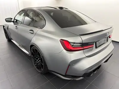 BMW M3 Competition M xDrive 2025 — Berline sportive 530 ch, quasi neuve avec garantie constructeur — side view