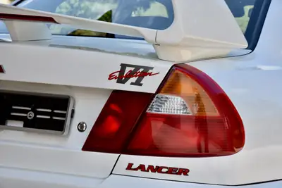 Mitsubishi Lancer EVO VI RS — Légende sportive 280 ch, historique préservé — côté