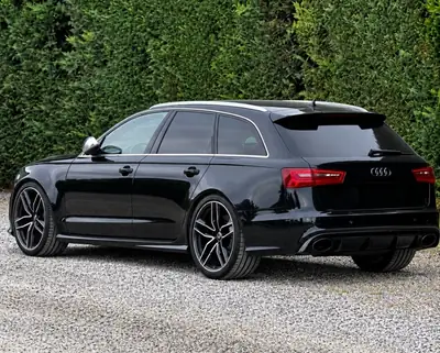 Audi RS6 Avant 4.0 V8 TFSI — Break haute performance, 560 ch et traction intégrale — fianco