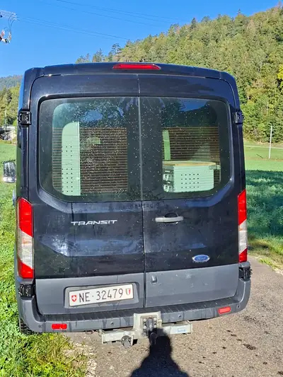 Ford Transit 2.0 TDCi 170 Trend 4×4 — Utilitaire robuste, attelage 3,5 t, très peu kilométré — rear view
