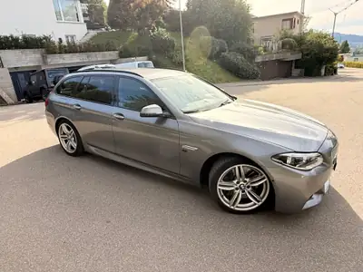BMW M550d xDrive Touring — Break sportif diesel, 381 ch, équipements premium — Heckansicht