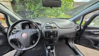 Fiat Punto Evo 1.4 T MultiAir 135 Sport — Citadine dynamique, entretien récent — Armaturenbrett