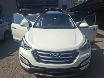 Hyundai Santa Fe 2016 — SUV 7 places diesel, 157 000 km, traction intégrale — fianco