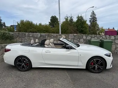 BMW M440i xDrive Cabriolet 2024 — Décapotable haute performance, 22 900 km — side view