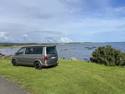 VW T6.1 2.0 TDI — Monospace familial 7 places avec portes coulissantes électriques — côté