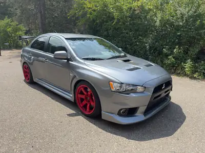 Mitsubishi Lancer 2.0 T MIVEC EVO Final Edition — Performance sportive et fiabilité japonaise — fianco