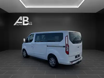 Ford Tourneo Custom 300 L1H1 Titanium — Monospace 8 places, diesel économe et fiable — rear view