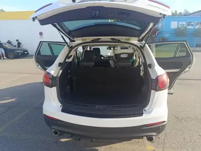 Mazda CX-9 3.7 V6 Revolution — Grand SUV 7 places puissant et fiable — side view