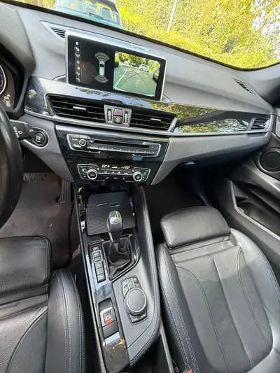 BMW X1 xDrive 20i M Sport — SUV compact dynamique, entretien complet — Thumbnail 9