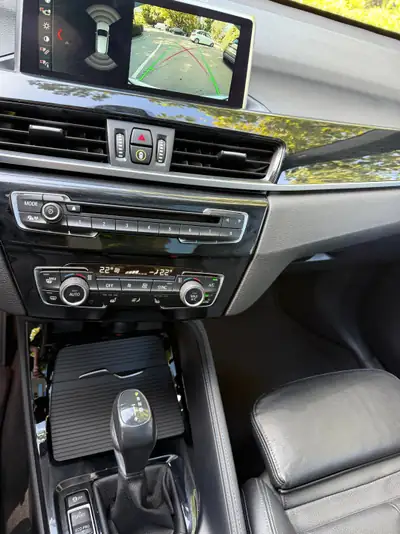 BMW X1 xDrive 20i M Sport — SUV compact dynamique, entretien complet — Thumbnail 16
