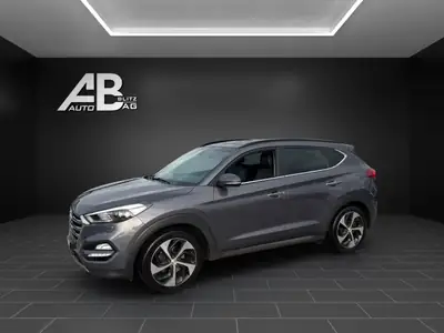 Hyundai Tucson 2.0 CRDI Vertex 4WD — SUV robuste, transmission automatique, 100 000 km — side view