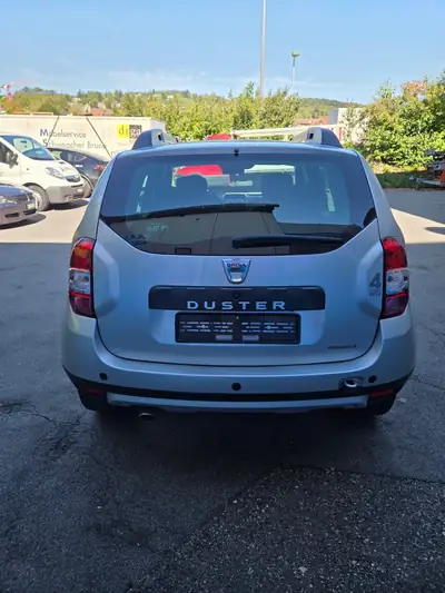 Dacia Duster 1.2 TCe Privilège 4x4 — SUV compact robuste, 34'000 km seulement — fianco