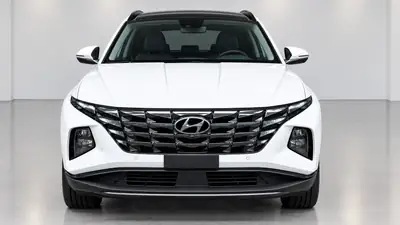 Hyundai Tucson 1.6 T-GDi PHEV Vertex 4WD — SUV hybride rechargeable, toit panoramique, 61'000 km — fianco