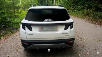 Hyundai Tucson 1.6 T-GDi PHEV Vertex 4WD — SUV hybride rechargeable, toit panoramique, 61'000 km — vista posteriore