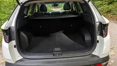 Hyundai Tucson 1.6 T-GDi PHEV Vertex 4WD — SUV hybride rechargeable, toit panoramique, 61'000 km — Miniatura 10