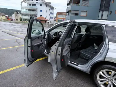 Audi Q7 3.0 V6 TDI 272 quattro — SUV premium 7 places, diesel performant — rear view