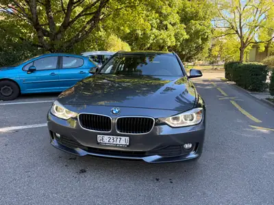 BMW 320d xDrive Touring — Break diesel performant, première main suisse — side view