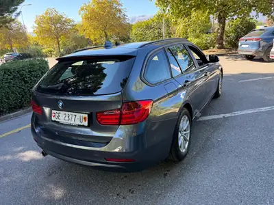 BMW 320d xDrive Touring — Break diesel performant, première main suisse — rear view