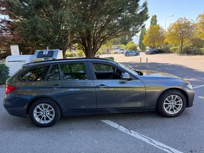 BMW 320d xDrive Touring — Break diesel performant, première main suisse — interior