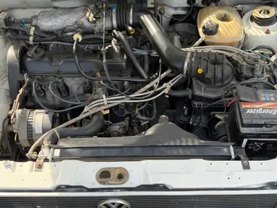 VW Caddy 1.8 GTI Pick-up 1989 — Utilitaire sportif rétro, fraîchement révisé — Miniature 10
