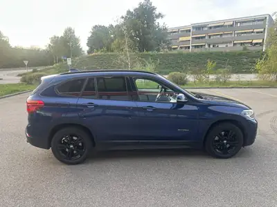 BMW X1 20d xDrive — SUV robuste diesel, 8 jantes, historique sans sinistre — rear view