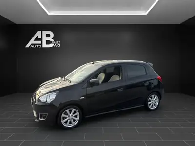 Mitsubishi Space Star 1.2 Intense — Citadine polyvalente, fraîchement révisée et contrôle technique à jour — côté