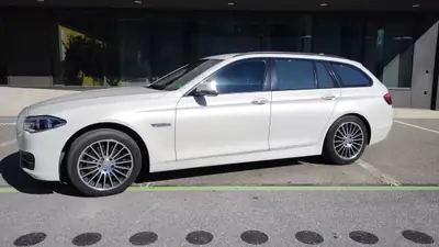 BMW 520d xDrive Touring — Break diesel 184 ch, faible consommation et traction intégrale — fianco