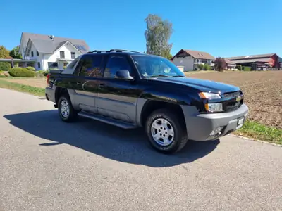 Chevrolet Avalanche 4x4 — Le pick-up polyvalent américain, 290 ch et 113'000 km — side view