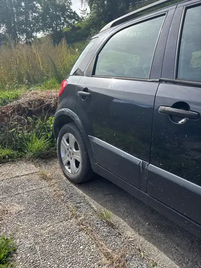 FIAT Sedici 1.6 16V Dynamic — SUV compact robuste, 165 000 km, sans sinistre — side view