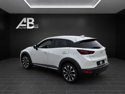 Mazda CX-3 SKYACTIV-G 121 — Compact SUV fiable, essence économique, 117'000 km — Heckansicht
