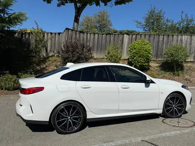 BMW 216 Gran Coupé 218i — Élégance compacte et efficacité à 54 000 km — fianco