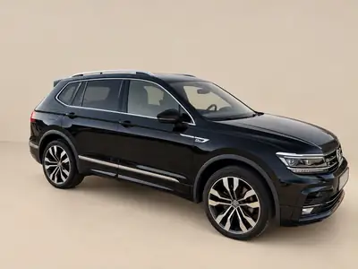 VW Tiguan Allspace 2.0 TDI R-Line — SUV 7 places spacieux, moteur puissant, entretien régulier — side view