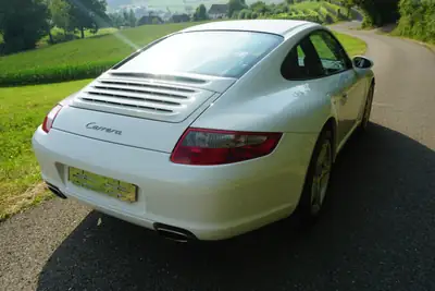 Porsche 911 Carrera 3.6 — Légendaire coupé sport avec faible kilométrage — fianco