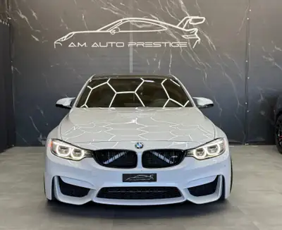 BMW M3 Drivelogic 2014 — Berline sportive 431 ch, révisée et équipée — fianco