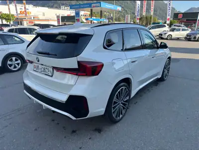 BMW X1 23i xDrive 2023 — SUV compact dynamique, 37 500 km, équipé de pneus hiver — rear view
