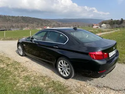 BMW 528i xDrive 2013 — Berline premium 4x4, entretien BMW complet, pneus neige inclus — side view