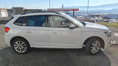 Skoda Kamiq 1.5 TSI Style DSG — SUV compact dynamique, sans sinistre, 92 000 km — side view