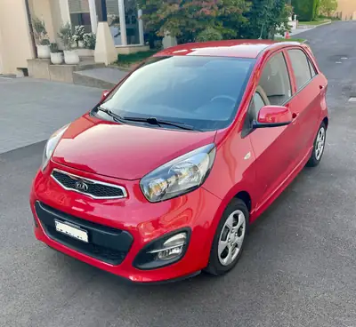 Kia Picanto 1.2 Trend — Citadine automatique fiable, 92'500 km, rouge métallisé — vue extérieure