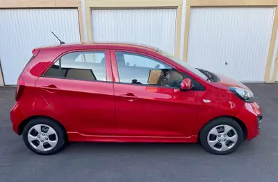 Kia Picanto 1.2 Trend — Citadine automatique fiable, 92'500 km, rouge métallisé — intérieur