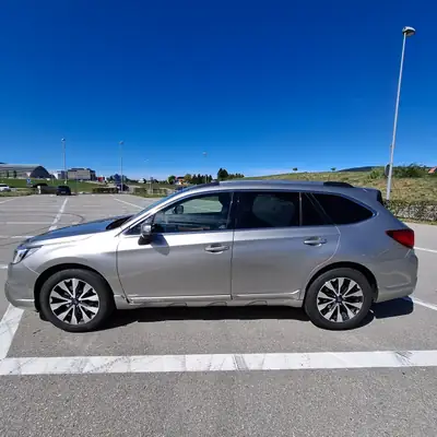 Subaru Outback 2.0 D Luxury — Break polyvalent diesel, transmission CVT, 150 000 km — côté