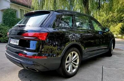 Audi Q7 55 TFSI e quattro — SUV hybride rechargeable, 75'000 km, excellence allemande — rear view
