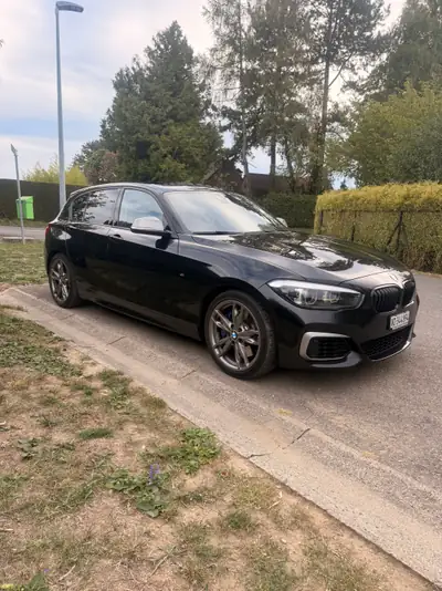 BMW M140i xDrive — Berline sport dynamique, 340 ch et transmission intégrale — côté