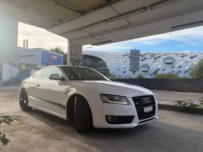 Audi A5 Coupé 3.0 V6 TDI Quattro — Élégance sportive et moteur puissant — côté