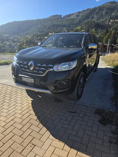 Renault Alaskan 2.3 dCi 190 TwinTurbo — Pickup 4x4 robuste, entretien Renault complet — fianco
